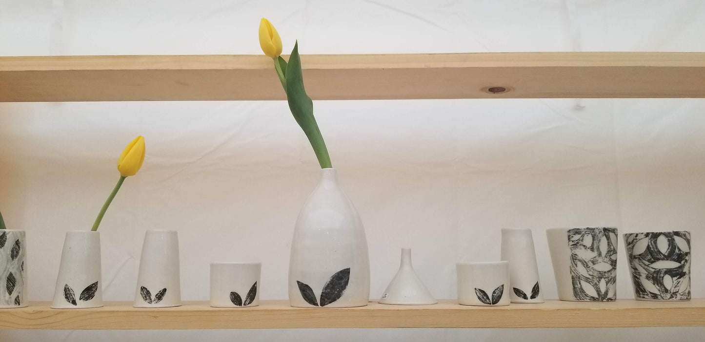 Monoprinted bud vases, shelf display. Handmade pottery. Handmade ceramics.
