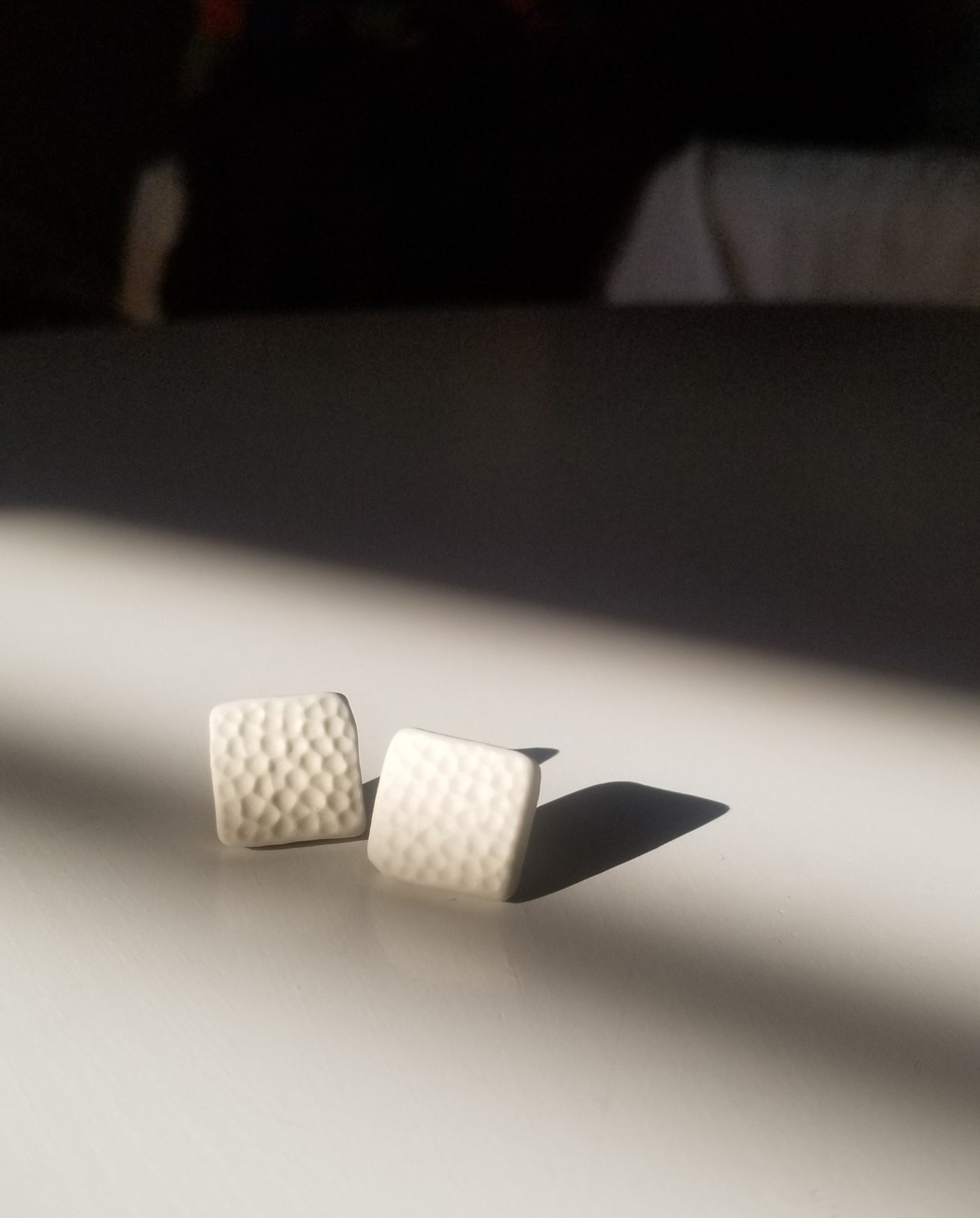 Dimpled square whtie studs. Handmade pottery. Handmade ceramics.