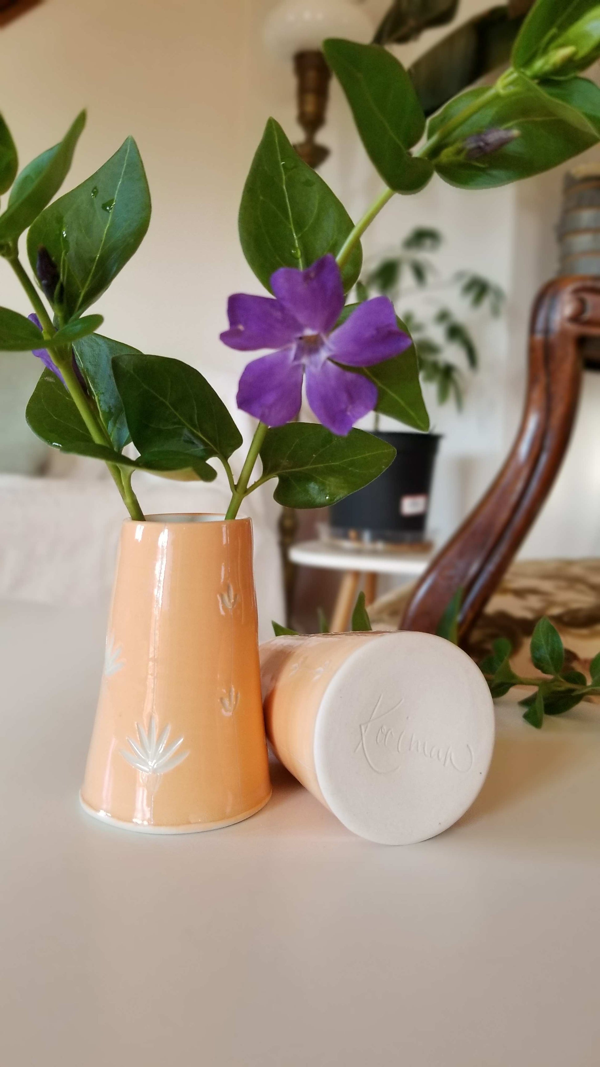 Carved floral bud vases, sherbet orange. Handmade pottery. Handmade ceramics.