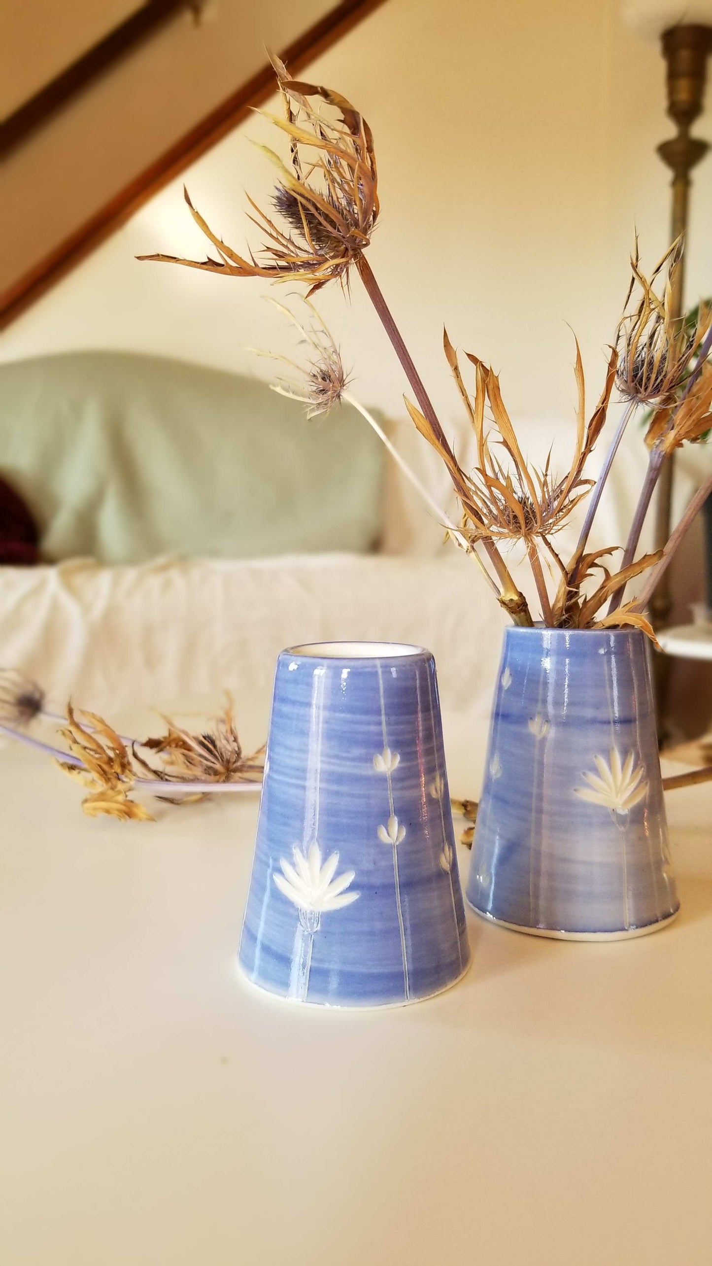 Carved floral bud vases, cornflower blue. Handmade pottery. Handmade ceramics.