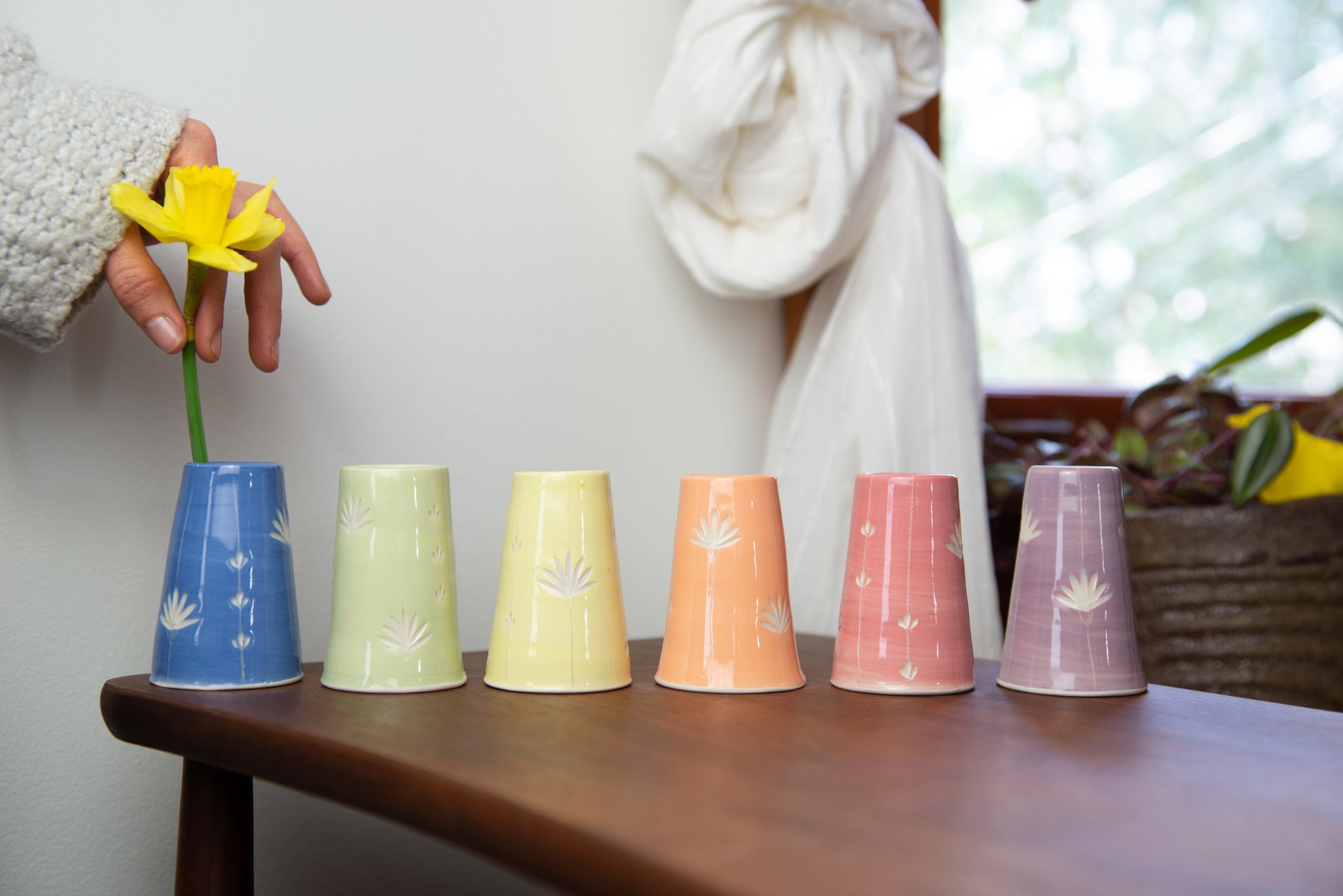 Carved floral bud vases, color range. Handmade pottery. Handmade ceramics.